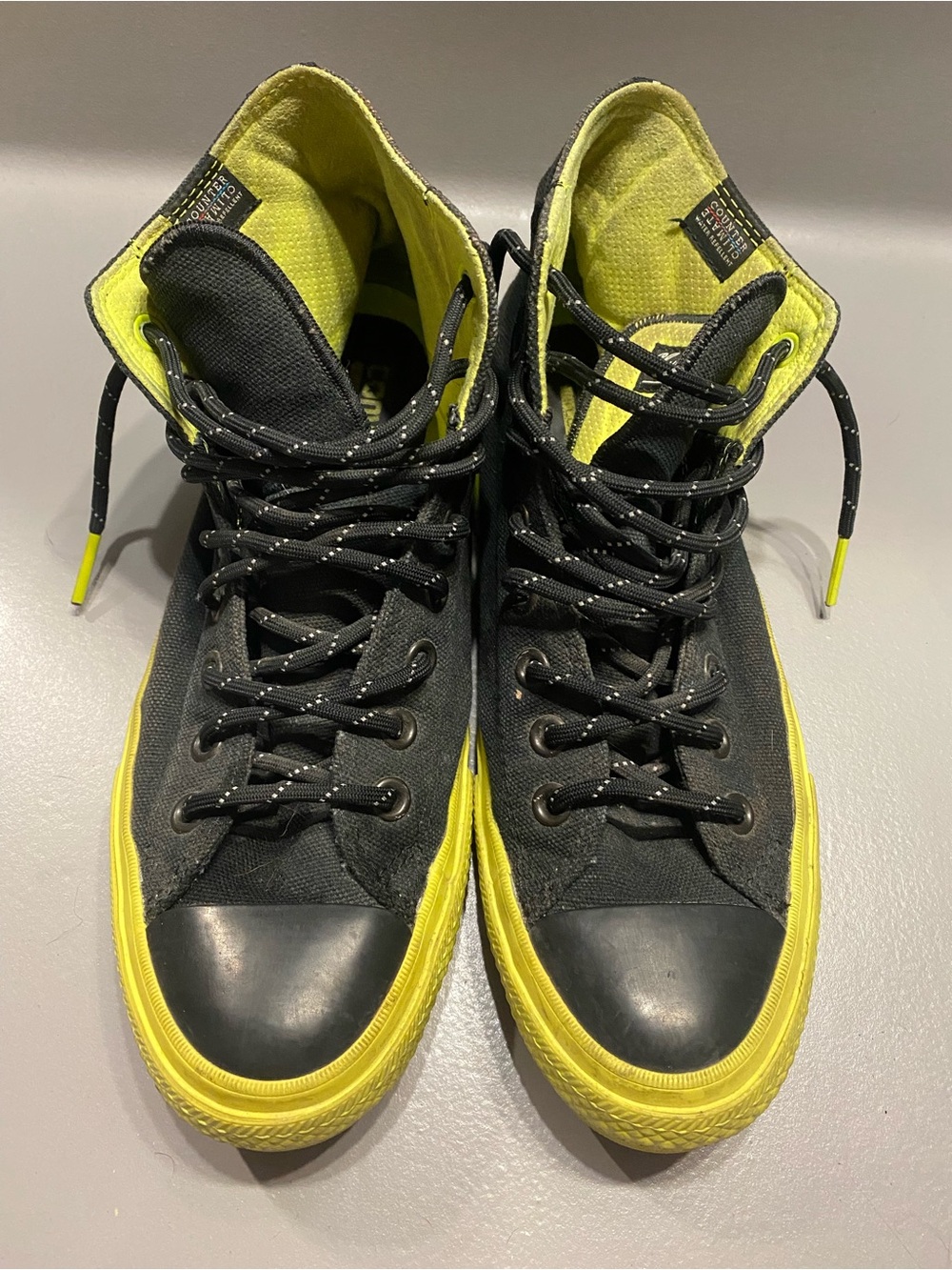 Converse Black and Yellow High-Top Sneakers
